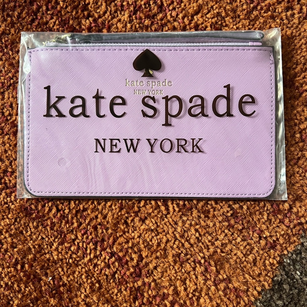 Kate Spade New York wristlet. New in bag. Lavender.
